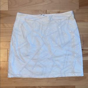 White and silver lined mesh sequin mini skirt